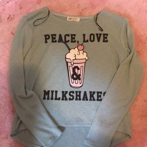 Cute teal  that says peace love and milkshakes